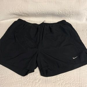 Nike dry fit Black running shorts.  Key pocket sewn into top of undies size L.